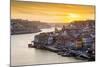 Portugal, Douro Litoral, Porto. Sunset over the UNESCO listed Ribeira district, viewed from Dom Lui-Nick Ledger-Mounted Photographic Print