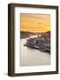 Portugal, Douro Litoral, Porto. Sunset over the UNESCO listed Ribeira district, viewed from Dom Lui-Nick Ledger-Framed Photographic Print