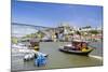 Portugal, Douro Litoral, Porto. Tourists boats on Douro River in the UNESCO listed Ribeira district-Nick Ledger-Mounted Photographic Print