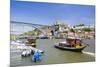 Portugal, Douro Litoral, Porto. Tourists boats on Douro River in the UNESCO listed Ribeira district-Nick Ledger-Mounted Photographic Print