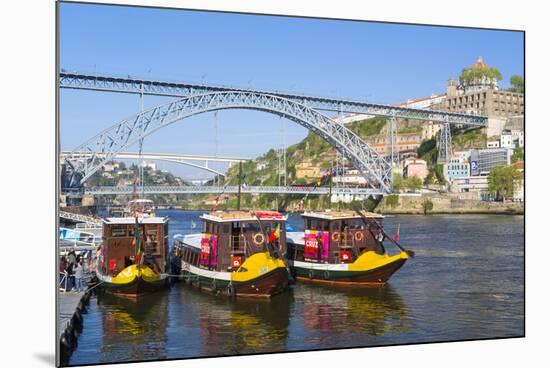 Portugal, Douro Litoral, Porto. Tourists boats on Douro River in the UNESCO listed Ribeira district-Nick Ledger-Mounted Photographic Print