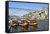 Portugal, Douro Litoral, Porto. Tourists boats on Douro River in the UNESCO listed Ribeira district-Nick Ledger-Framed Stretched Canvas