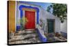 Portugal, Obidos, Bright Red Door of Colored Homes Inside the Walled City-Terry Eggers-Stretched Canvas