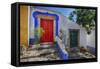 Portugal, Obidos, Bright Red Door of Colored Homes Inside the Walled City-Terry Eggers-Framed Stretched Canvas