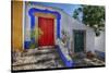 Portugal, Obidos, Bright Red Door of Colored Homes Inside the Walled City-Terry Eggers-Stretched Canvas