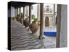 Portugal, Obidos. Ceramic pots adorning a building ledge.-Terry Eggers-Stretched Canvas