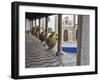 Portugal, Obidos. Ceramic pots adorning a building ledge.-Terry Eggers-Framed Photographic Print