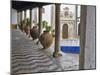 Portugal, Obidos. Ceramic pots adorning a building ledge.-Terry Eggers-Mounted Photographic Print