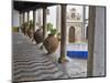 Portugal, Obidos. Ceramic pots adorning a building ledge.-Terry Eggers-Mounted Photographic Print