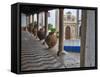 Portugal, Obidos. Ceramic pots adorning a building ledge.-Terry Eggers-Framed Stretched Canvas