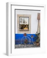 Portugal, Obidos. Cute bicycle planter in front of a bakery in the walled city of Obidos.-Julie Eggers-Framed Photographic Print