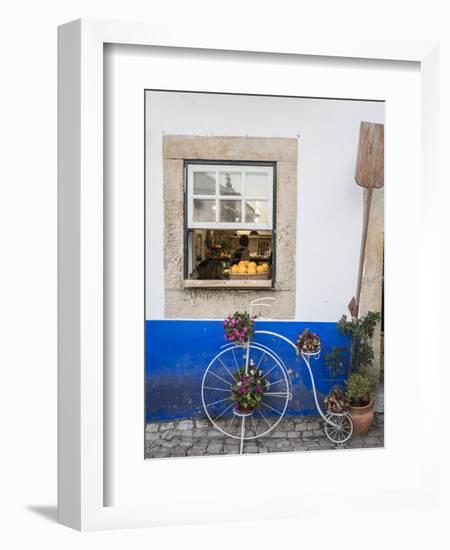 Portugal, Obidos. Cute bicycle planter in front of a bakery in the walled city of Obidos.-Julie Eggers-Framed Photographic Print