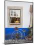 Portugal, Obidos. Cute bicycle planter in front of a bakery in the walled city of Obidos.-Julie Eggers-Mounted Photographic Print