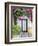 Portugal, Obidos. Doorway surrounded by a bougainvillea vine.-Julie Eggers-Framed Photographic Print