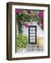 Portugal, Obidos. Doorway surrounded by a bougainvillea vine.-Julie Eggers-Framed Photographic Print