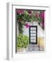 Portugal, Obidos. Doorway surrounded by a bougainvillea vine.-Julie Eggers-Framed Photographic Print