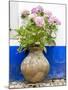 Portugal, Obidos. Pink hydrangea in an old pottery against a white and blue wall-Julie Eggers-Mounted Photographic Print