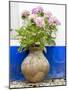 Portugal, Obidos. Pink hydrangea in an old pottery against a white and blue wall-Julie Eggers-Mounted Photographic Print