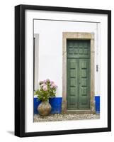 Portugal, Obidos. Pink hydrangea in terracotta pot next to a green door.-Julie Eggers-Framed Photographic Print