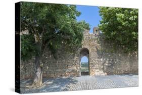 Portugal, Obidos, View of Farm Through Battlement Opening in Courtyard-Lisa S. Engelbrecht-Stretched Canvas