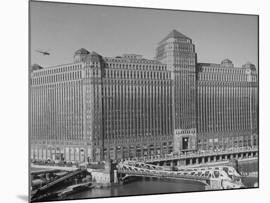 Postal Service Helicopter Nearing Merchandise Mart-null-Mounted Photographic Print