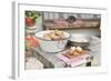 Potatoes, Partly Peeled, on Table in Front of Farmhouse-Eising Studio - Food Photo and Video-Framed Photographic Print