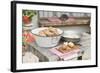 Potatoes, Partly Peeled, on Table in Front of Farmhouse-Eising Studio - Food Photo and Video-Framed Photographic Print