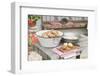 Potatoes, Partly Peeled, on Table in Front of Farmhouse-Eising Studio - Food Photo and Video-Framed Photographic Print