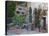 Potted Plants Decorate a Patio in Tuscany, Petroio, Italy-Dennis Flaherty-Stretched Canvas