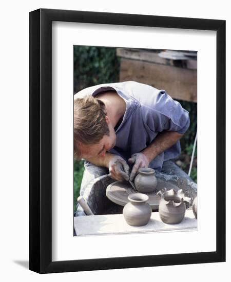 Potter at Work on Wheel at Rustic Fayre, Devon, England, United Kingdom-Ian Griffiths-Framed Photographic Print