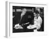 Pouring Champagne from a Huge Tilted Toward Glass Held on Tray by Waiter, at the Hotel Hilton-Ralph Crane-Framed Photographic Print