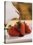 Pouring Chocolate Sauce over Fresh Strawberries-Andrew Pini-Stretched Canvas