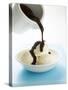 Pouring Chocolate Sauce over Vanilla Ice Cream-null-Stretched Canvas