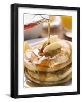 Pouring Maple Syrup over Pancakes with Dab of Butter-null-Framed Photographic Print