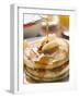 Pouring Maple Syrup over Pancakes with Dab of Butter-null-Framed Photographic Print