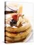 Pouring Maple Syrup over Waffles with Butter and Berries-null-Stretched Canvas