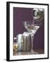 Pouring Martini Out of Cocktail Shaker into Glass-null-Framed Photographic Print