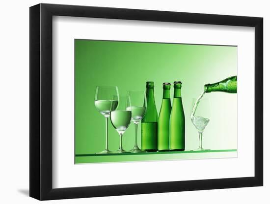 Pouring Mineral Water into Glass-Klaus Arras-Framed Photographic Print