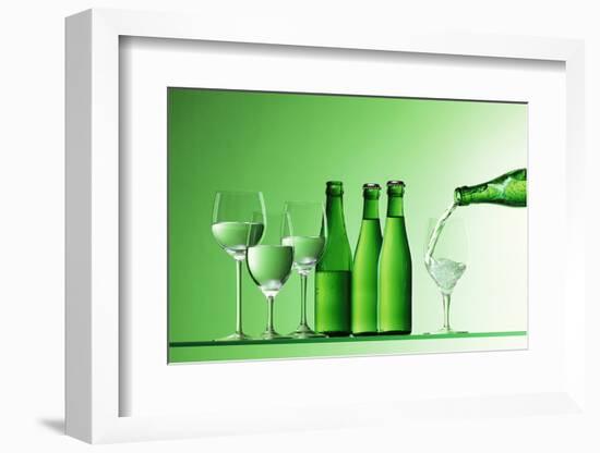 Pouring Mineral Water into Glass-Klaus Arras-Framed Photographic Print