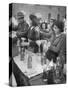 Pouring Olive Oil in Buyers' Bottles in Black Market-Alfred Eisenstaedt-Stretched Canvas