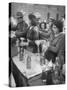 Pouring Olive Oil in Buyers' Bottles in Black Market-Alfred Eisenstaedt-Stretched Canvas