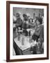 Pouring Olive Oil in Buyers' Bottles in Black Market-Alfred Eisenstaedt-Framed Photographic Print