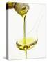 Pouring Olive Oil Over a Spoon-Marc O^ Finley-Stretched Canvas