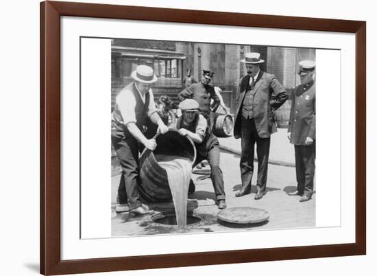 Pouring Out Illegal Alcohol into a Sewer-null-Framed Premium Giclee Print