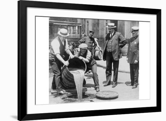 Pouring Out Illegal Alcohol into a Sewer-null-Framed Premium Giclee Print