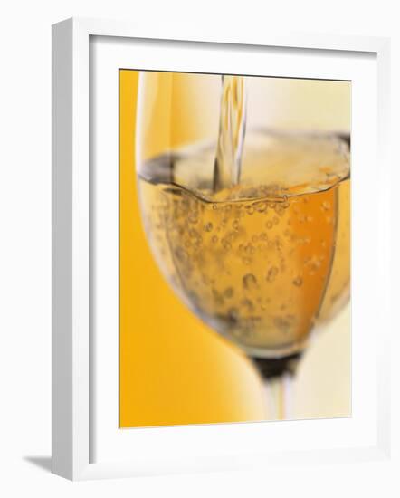 Pouring Prosecco into a Glass-Alexander Feig-Framed Photographic Print