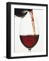 Pouring Red Wine into a Glass-null-Framed Photographic Print