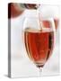 Pouring Rose Wine into Wine Glass-Joff Lee-Stretched Canvas