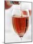 Pouring Rose Wine into Wine Glass-Joff Lee-Mounted Photographic Print