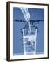 Pouring Water from a Bottle into a Glass-Petr Gross-Framed Photographic Print